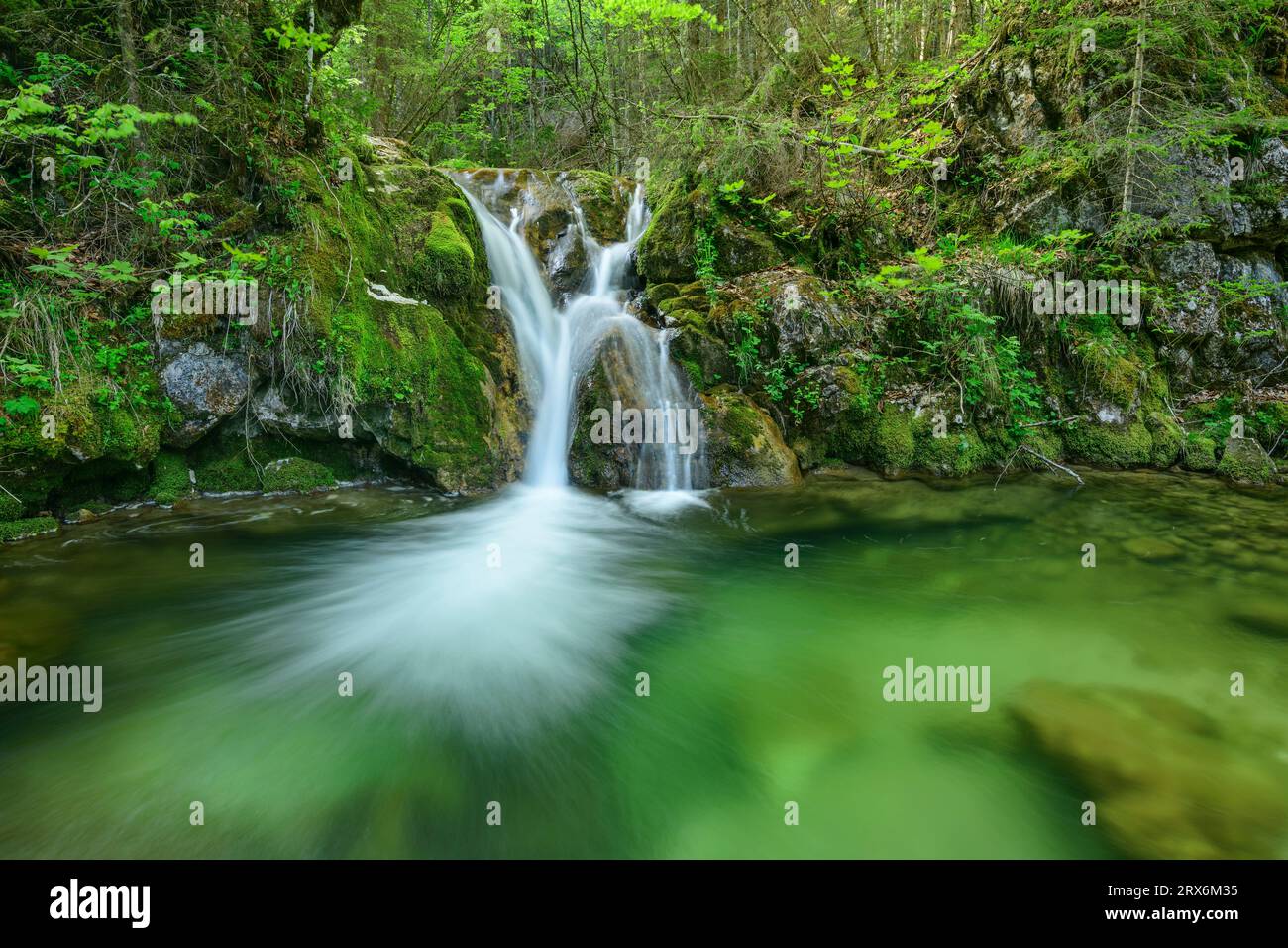 Scenic waterfall on rocky mountains near river Stock Photo - Alamy