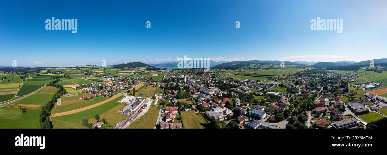Austria, Upper Austria, Saint Georgen im Attergau, Drone panorama of rural town in summer Stock Photo
