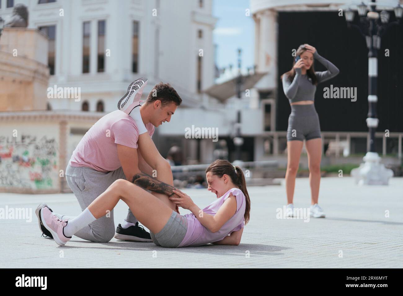 Sportsgirl screaming in pain after she suffered a leg muscle injury ...