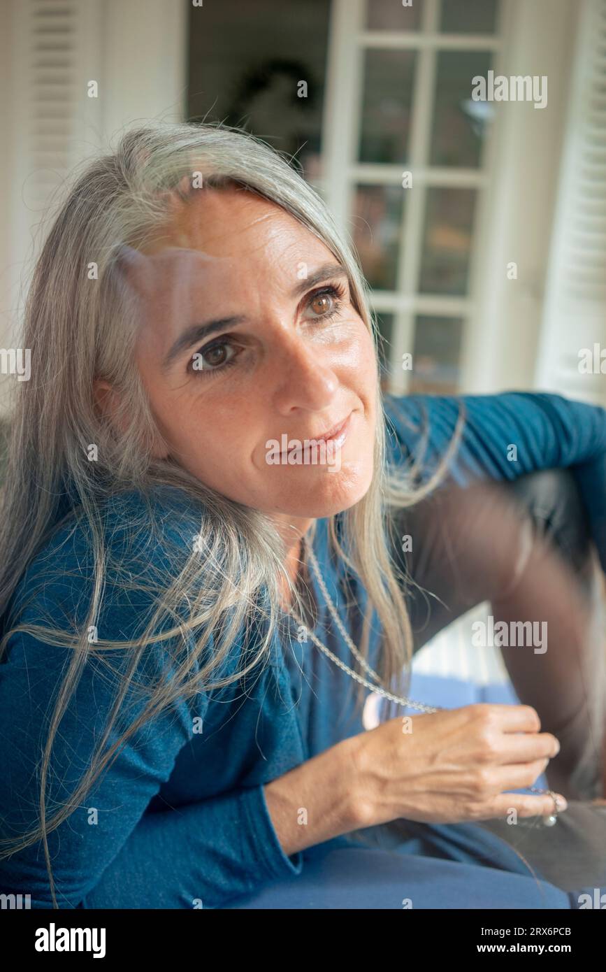 Mature mixed race woman pensive hi-res stock photography and images - Alamy