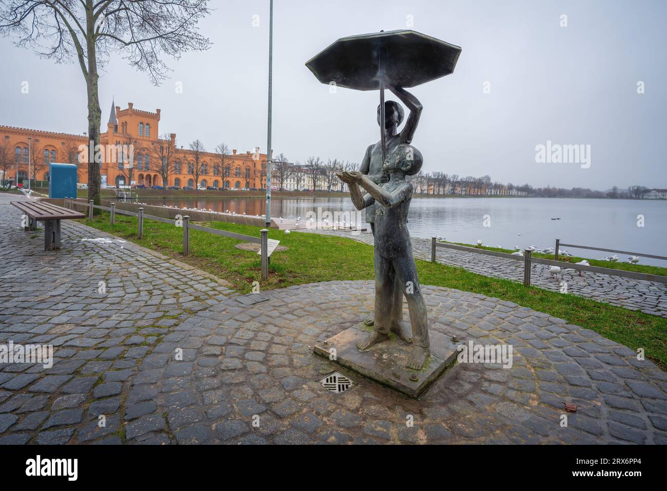 Children under an Umbrella Sculpture (Schirmkinder) by Stephan Horota