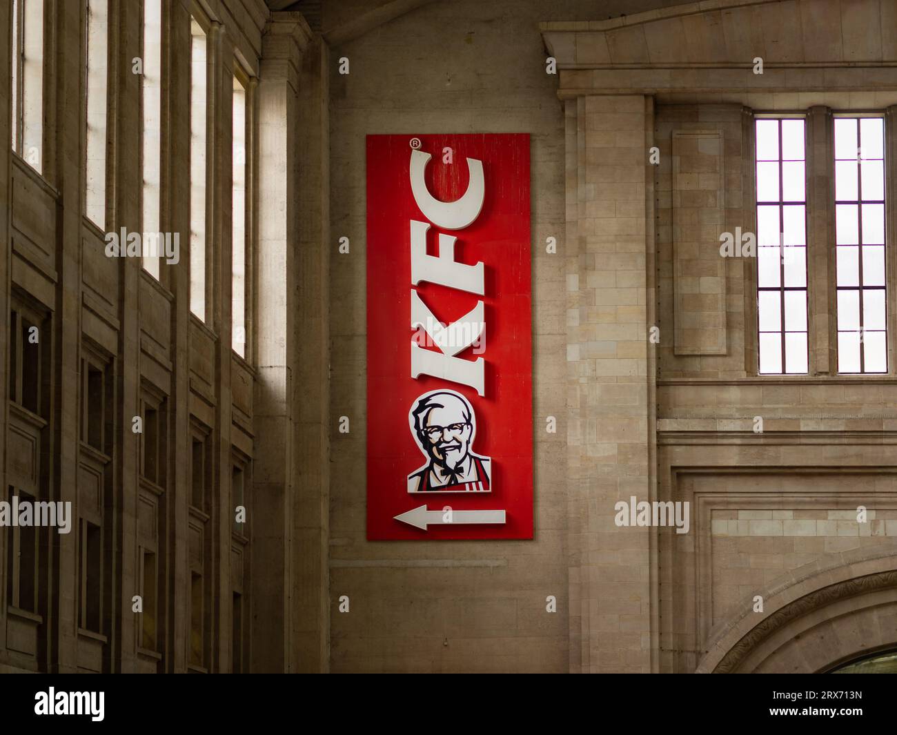 KFC logo sign of the Kentucky Fried Chicken restaurant company. American fast food lifestyle with a franchise business model and many stores. Stock Photo