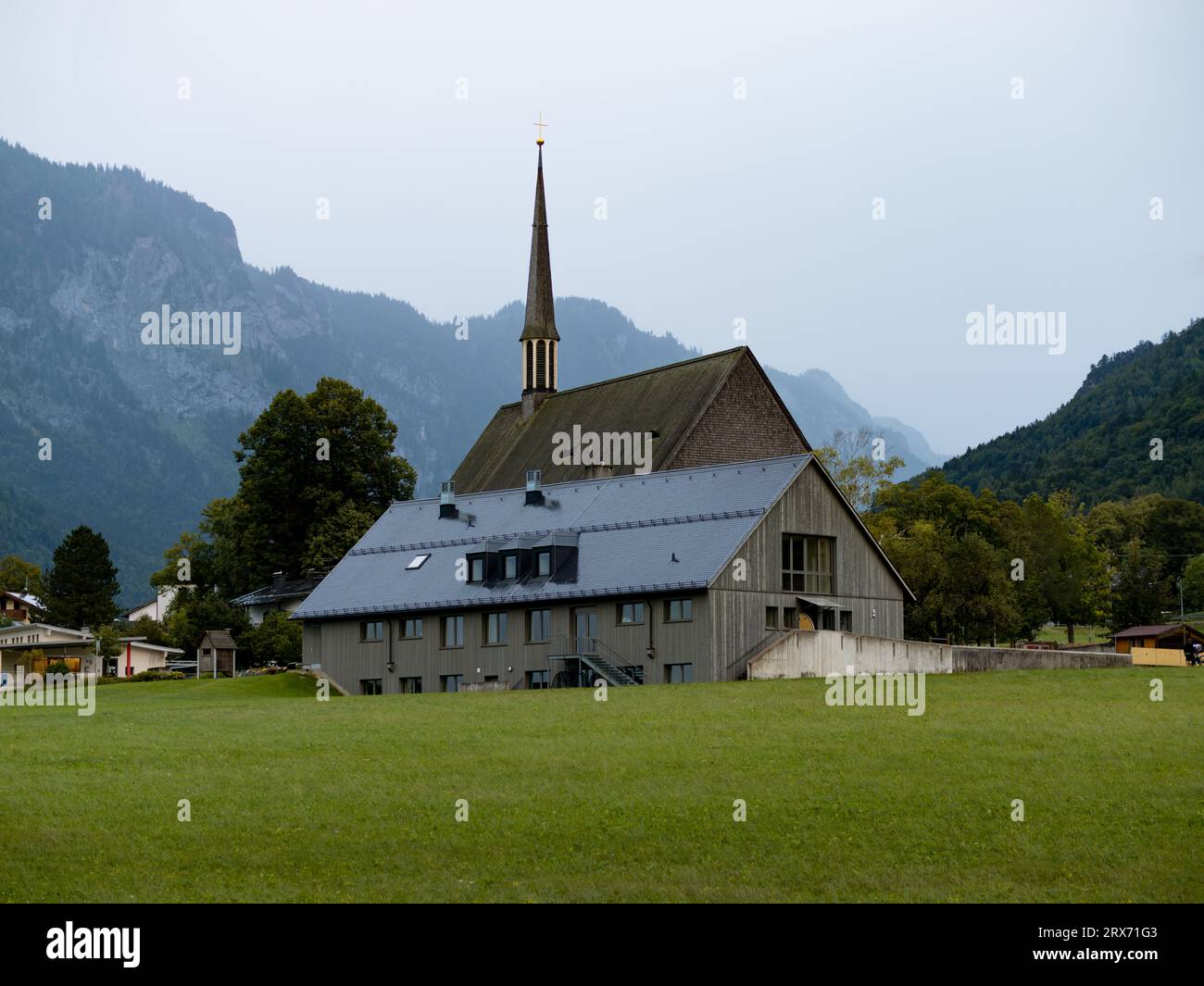 Catholic kindergarten St. Bruder Klaus and the church building behind