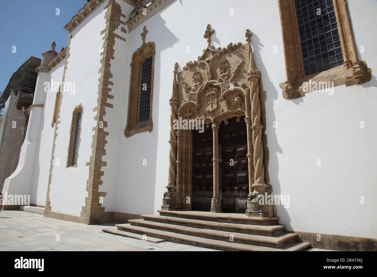 The 16th.Century doors of the Church of Saint Miguel ,by Marcos Pires, in Manueline style, of the University of Coimbra in Coimbra, Portugal Stock Photo