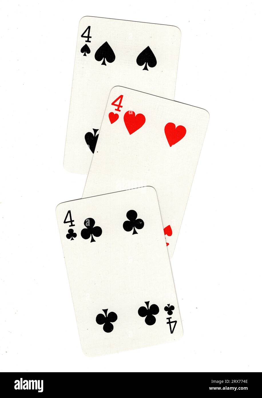 Vintage playing cards showing three fours on a white background Stock ...