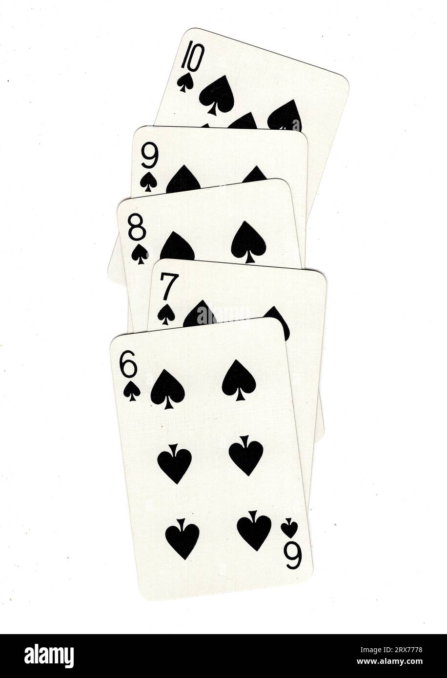 A hand of vintage poker playing cards featuring a straight flush of
