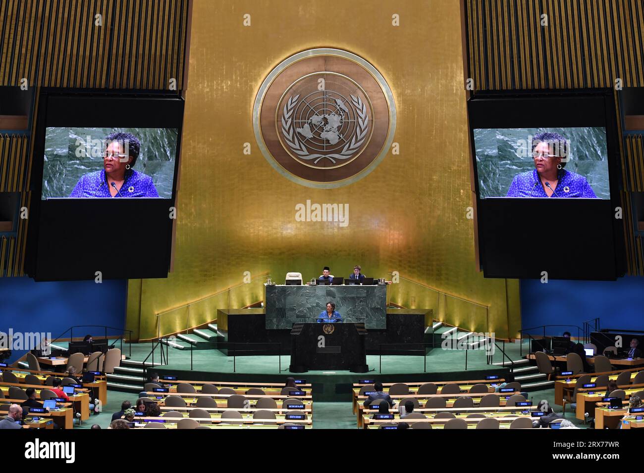 United Nations. 22nd Sep, 2023. Prime Minister of Barbados Mia Mottley (at the podium and on the screens) delivers a speech at the General Debate of the 78th session of the UN General Assembly at the UN headquarters in New York, Sept. 22, 2023. World leaders attending the 78th session of the UN General Assembly's general debate have emphasized the need for intensified efforts toward achieving the Sustainable Development Goals (SDGs), with midpoint assessments falling short. Credit: Li Rui/Xinhua/Alamy Live News Stock Photo