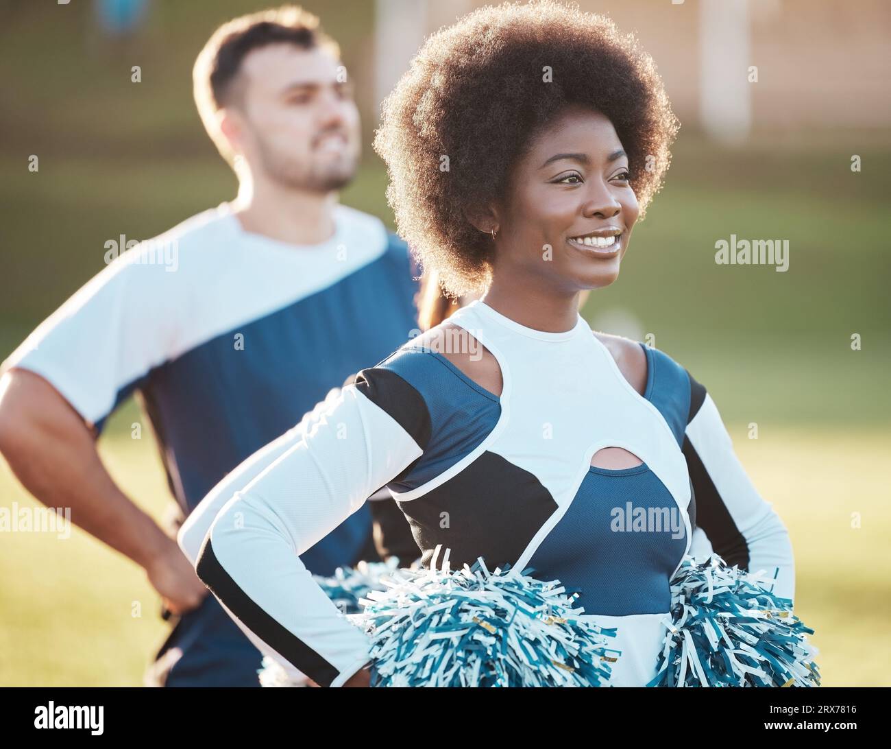 Cheerleader team, sports and black woman on field for performance, dance  and motivation for game. Teamwork, dancer and happy people cheer for  support Stock Photo - Alamy