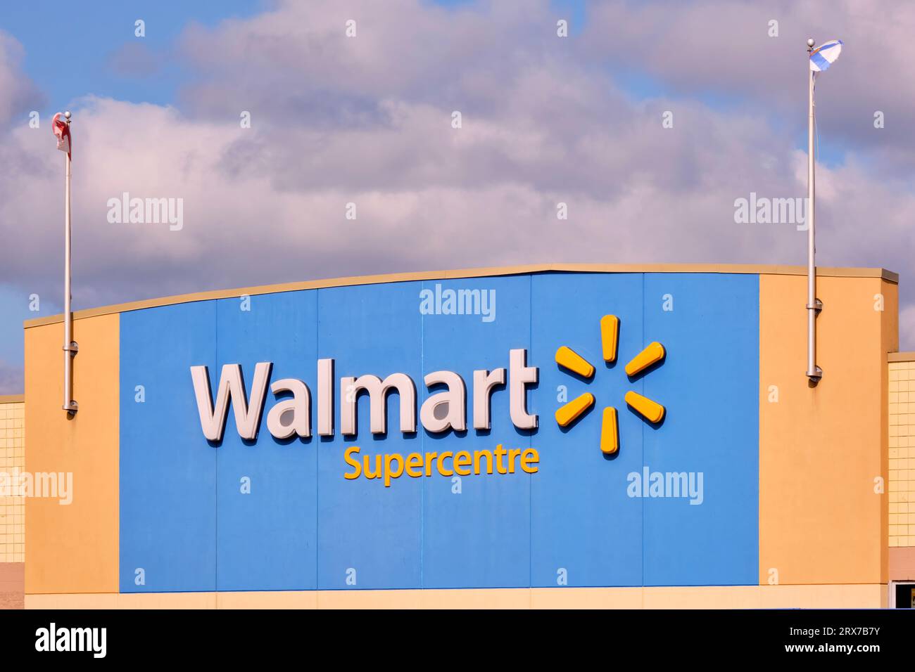 Sign over the front entrance of a Walmart Supercentre Stock Photo Alamy