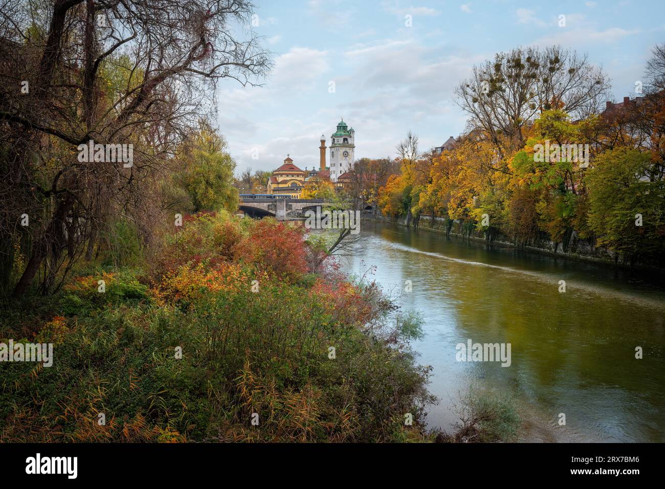 Isar River during Autumn Season with Mullersches Volksbad - Munich, Bavaria, Germany Stock Photo