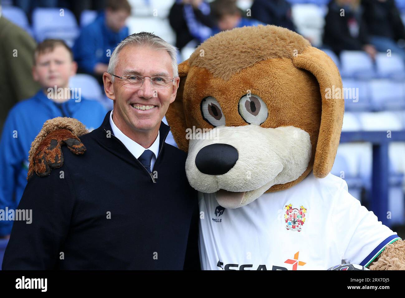 Birkenhead, UK. 23rd Sep, 2023. Nigel Adkins, the Manager of Tranmere Rovers (l) poses for a photograph with Rover the Dog, the official mascot of Tranmere Rovers Football Club. EFL Skybet Football league two match, Tranmere Rovers v Accrington Stanley at Prenton Park, Birkenhead, Wirral on Saturday 23rd September 2023. this image may only be used for Editorial purposes. Editorial use only, .pic by Chris Stading/ Credit: Andrew Orchard sports photography/Alamy Live News Stock Photo