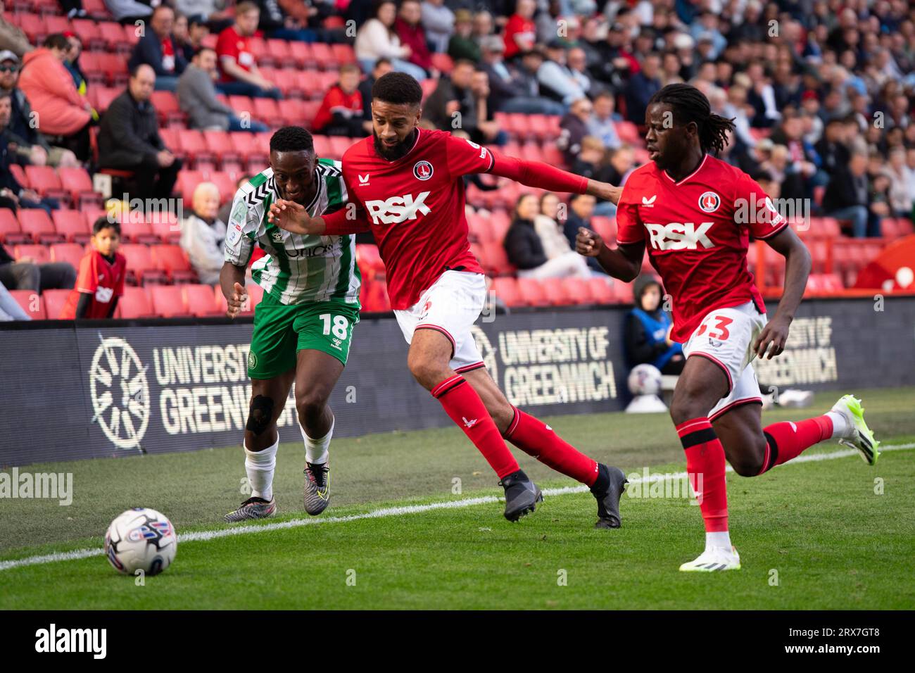 (left to right) Wycombe Wanderers Brandon Hanlan and Charlton Athletic's Michael Hector and Karoy Anderson battle for the ball during the Sky Bet League One match at The Valley, London. Picture date: Saturday September 23, 2023. Stock Photo