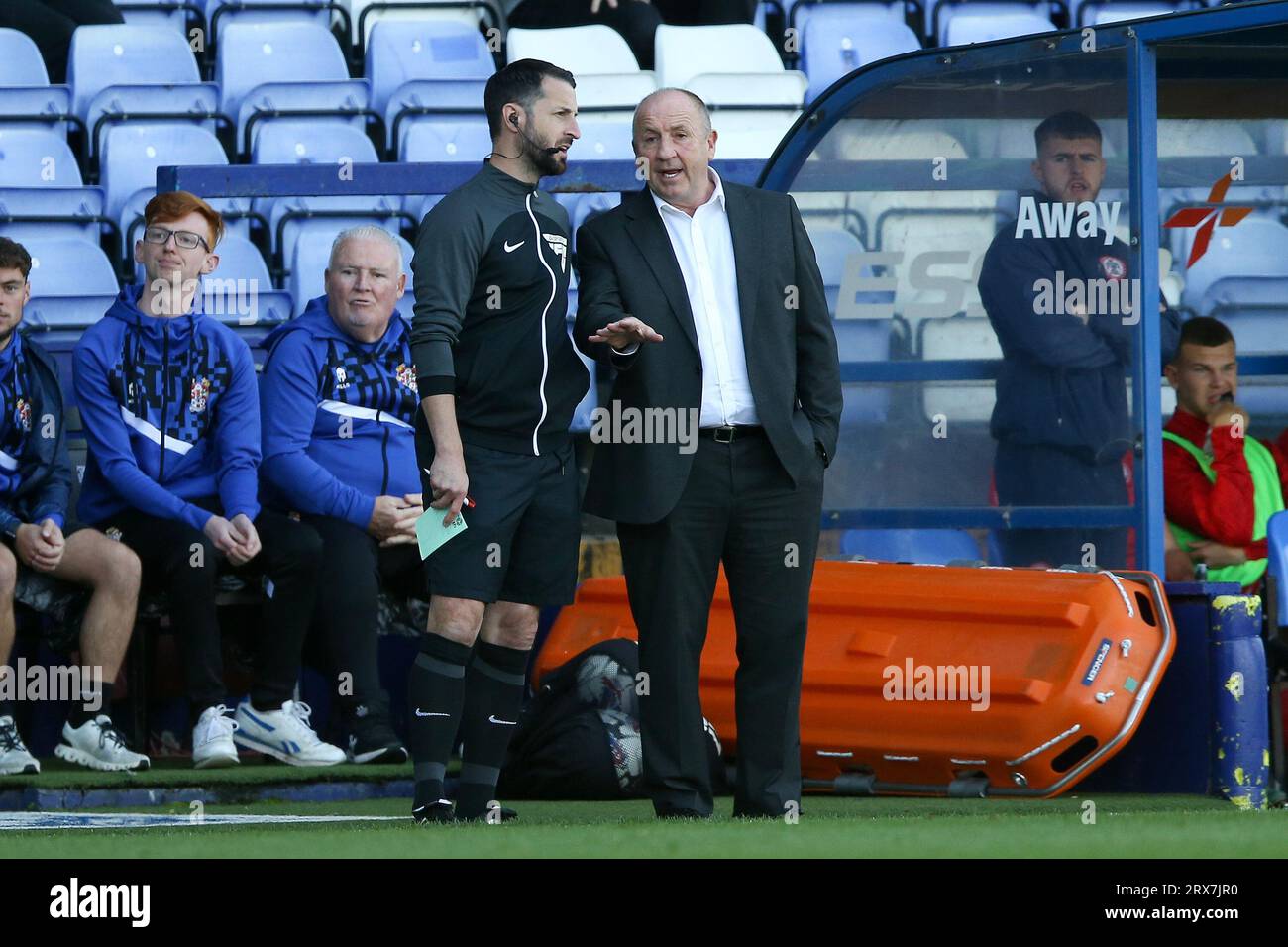 Birkenhead, UK. 23rd Sep, 2023. John Coleman, the Manager of Accrington Stanley (r) talked with the 4th official Christopher Husband. EFL Skybet Football league two match, Tranmere Rovers v Accrington Stanley at Prenton Park, Birkenhead, Wirral on Saturday 23rd September 2023. this image may only be used for Editorial purposes. Editorial use only, .pic by Chris Stading/ Credit: Andrew Orchard sports photography/Alamy Live News Stock Photo