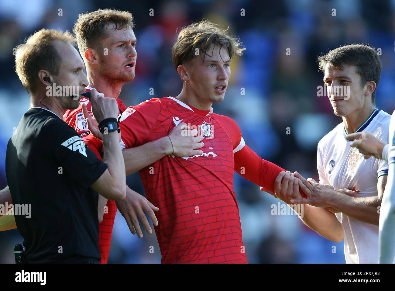 Birkenhead, UK. 23rd Sep, 2023. Brad Hills of Accrington Stanley is held back after a disagreement. EFL Skybet Football league two match, Tranmere Rovers v Accrington Stanley at Prenton Park, Birkenhead, Wirral on Saturday 23rd September 2023. this image may only be used for Editorial purposes. Editorial use only, .pic by Chris Stading/ Credit: Andrew Orchard sports photography/Alamy Live News Stock Photo