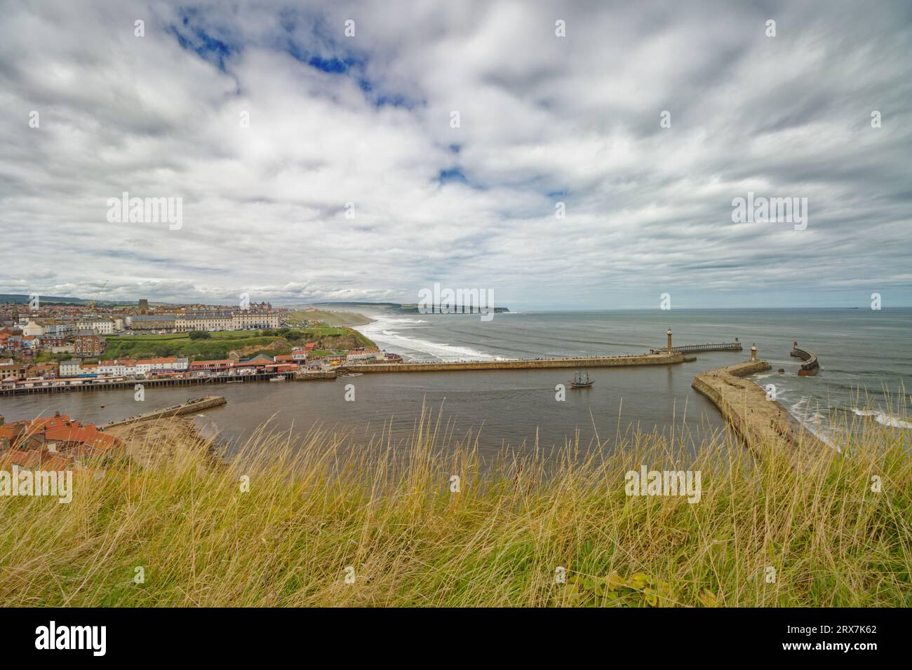 Whitby,England,9,August,2023.The Picture Shows ,The East and West Piers From St Mary's Church Stock Photo