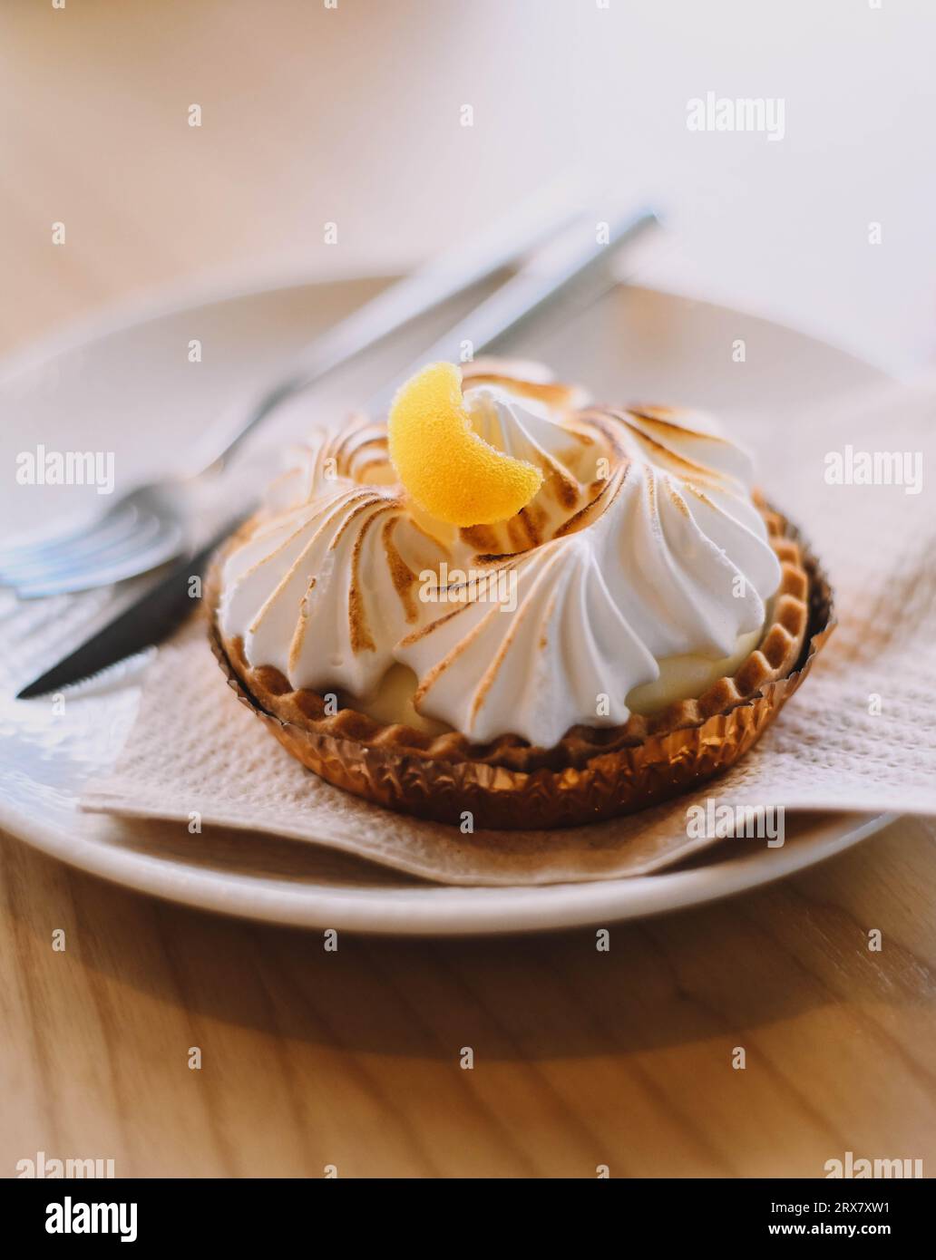 Lemon pie tartlet in a luxury Mediterranean cafe Stock Photo