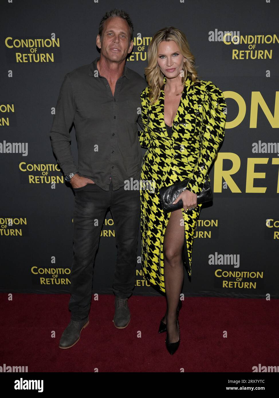 September 22, 2023, Los Angeles, California, United States: Chris Browning and Natasha Henstridge attend the Los Angeles Red Carpet Film Premiere for Condition Of Return. (Credit Image: © Billy Bennight/ZUMA Press Wire) EDITORIAL USAGE ONLY! Not for Commercial USAGE! Stock Photo