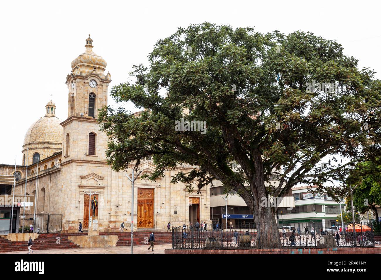 Duitama, Colombia - August 9th 2023. View of the Liberators Park and the historical Saint Lawrence Cathedral in Duitama which construction started in Stock Photo