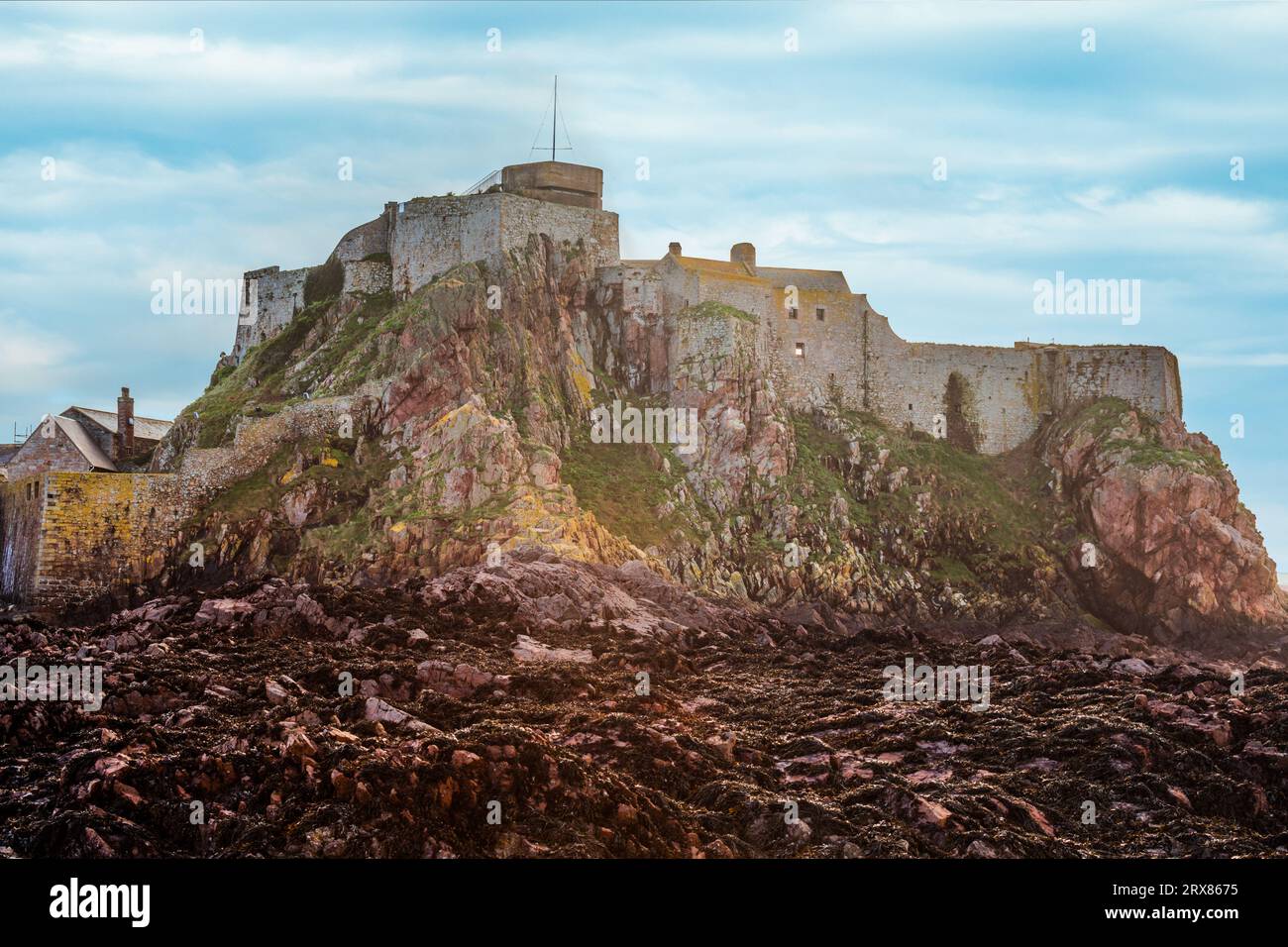 Elizabeth Castle in a low tide waters, Saint Helier, bailiwick of Jersey, Channel Islands Stock Photo