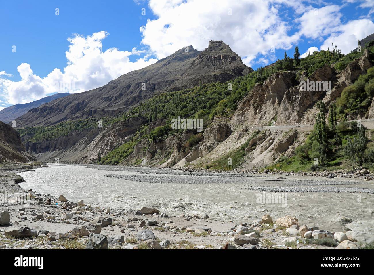 Melt water of the Hispar Glacier forming the Nagar River in northern Pakistan Stock Photo