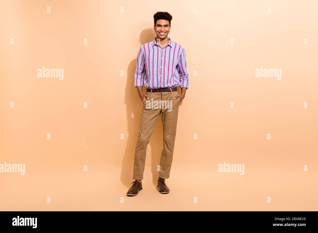 Photo of funny stylish grandpa positive emotions before senior party  meeting touch hold fingers suspenders wear shirt violet bow tie brown pants  Stock Photo - Alamy