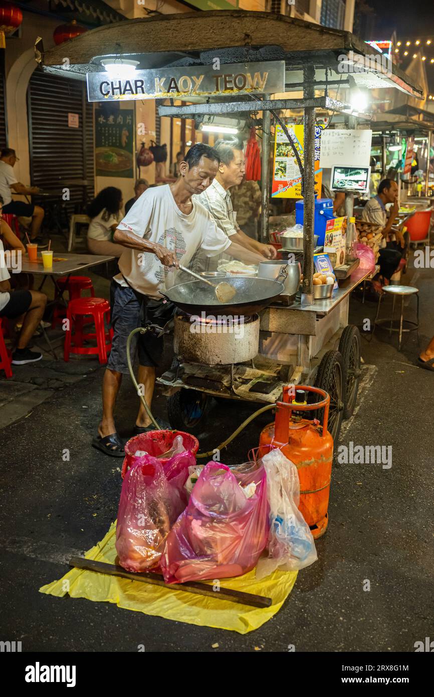 Preparing Char Kaoy Teow on Lebuh Carnarvon (Food Street),