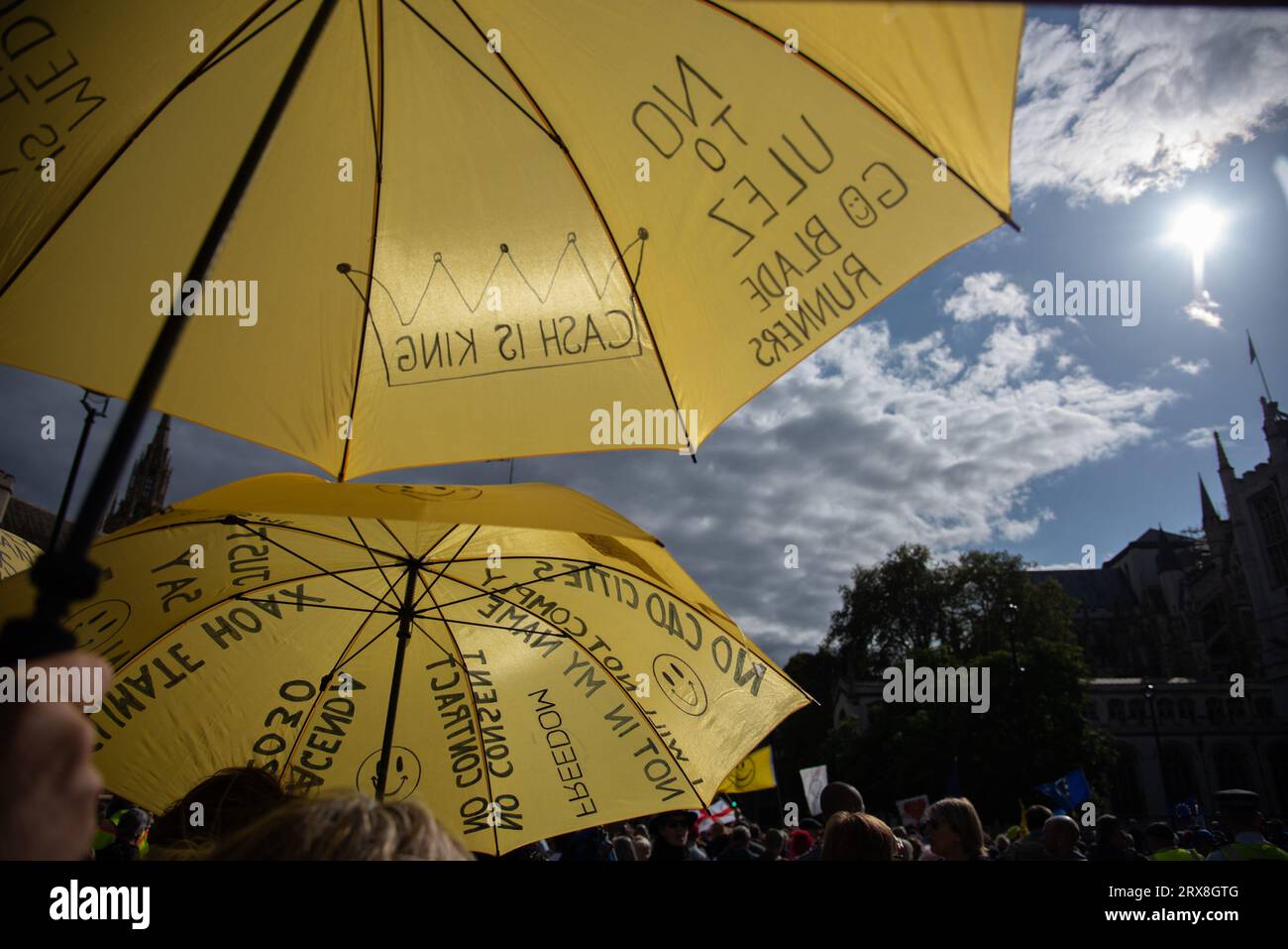 London, UK. 23rd Sep, 2023. Protestors hold yellow umbrellas with