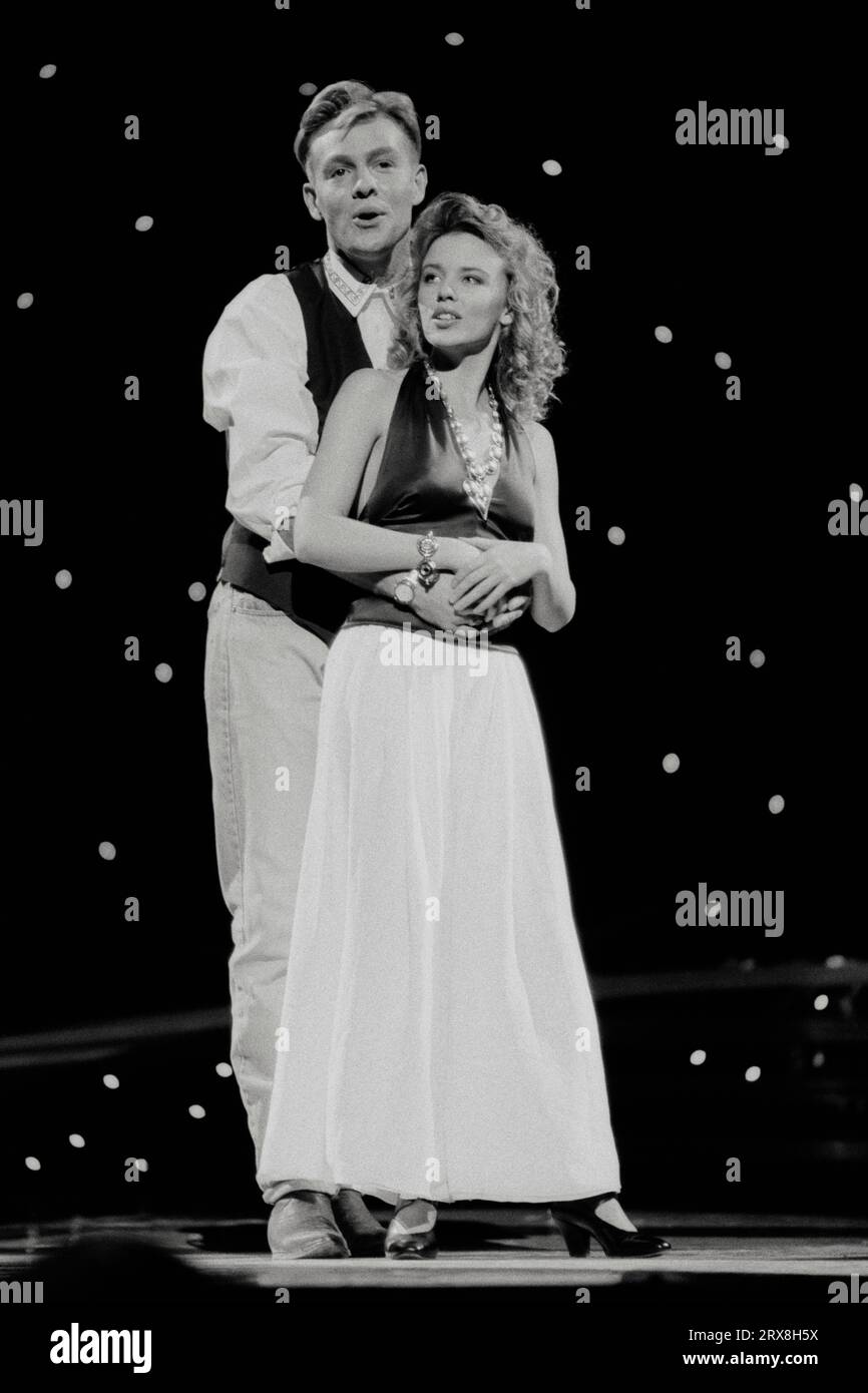 Kylie Minogue & Jason Donovan - perform Especially For You (Live The Children's Royal Variety Performance 14-04-1989). Former Neighbours stars turned pop singers Jason Donovan and Kylie Minogue rehearsing at the Dominion Theatre, London, for the Children's Royal Variety Performance 1989, to be attended by Princess Margaret. Stock Photo