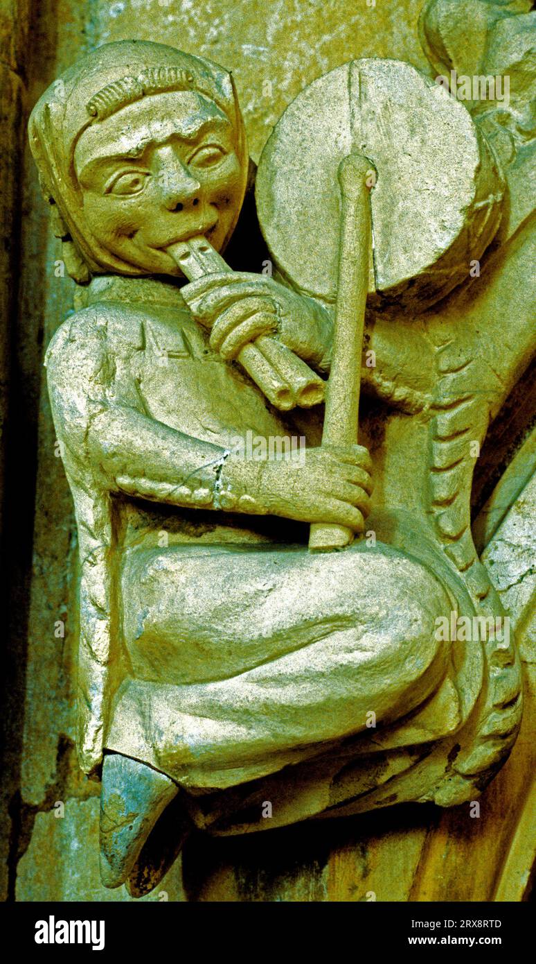 Beverley Minster, carved stone musician, Medieval carving, pipes and drum, Yorkshire, England, UK Stock Photo