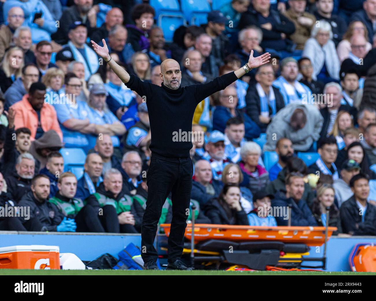 Manchester, UK. 24th Sep, 2023. Manchester City's head coach Pep Guardiola reacts during the English Premier League match between Manchester City and Nottingham Forest in Manchester, Britain, on Sept. 23, 2023. Credit: Xinhua/Alamy Live News Stock Photo
