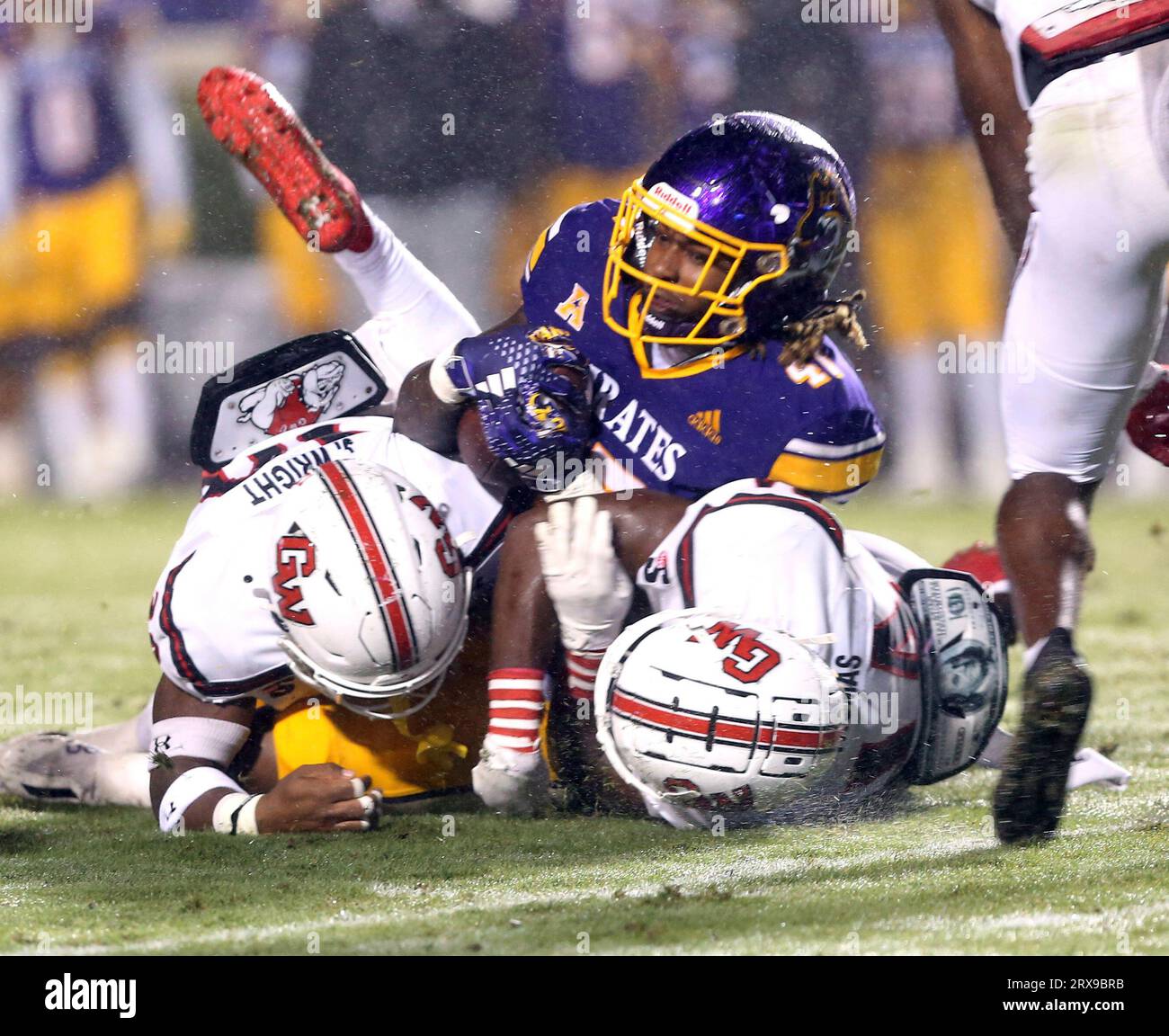 East Carolina's Rahjai Harris (47) runs the ball against GardnerWebb's