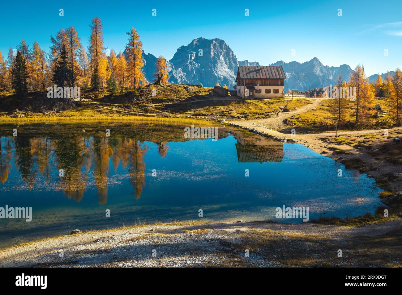 One of the most picturesque and famous small alpine lake in the Dolomites at autumn, lake Federa, Italy, Europe Stock Photo