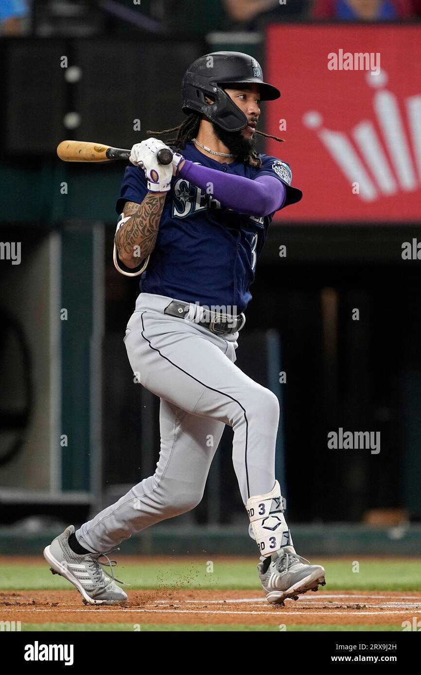 Seattle Mariners' J.P. Crawford follows through on a swing during