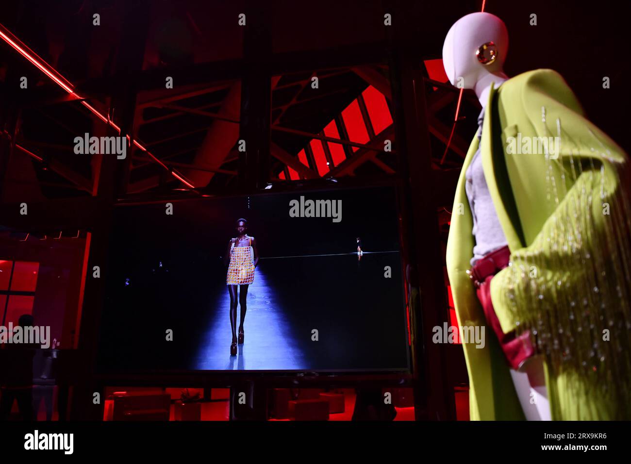 Milan, Italy. 23rd Sep, 2023. A fashion show video of Gucci women's Spring/Summer 2024 collections is played at the resee-themed event during Milan Fashion Week in Milan, Italy, on Sept. 23, 2023. Credit: Jin Mamengni/Xinhua/Alamy Live News Stock Photo