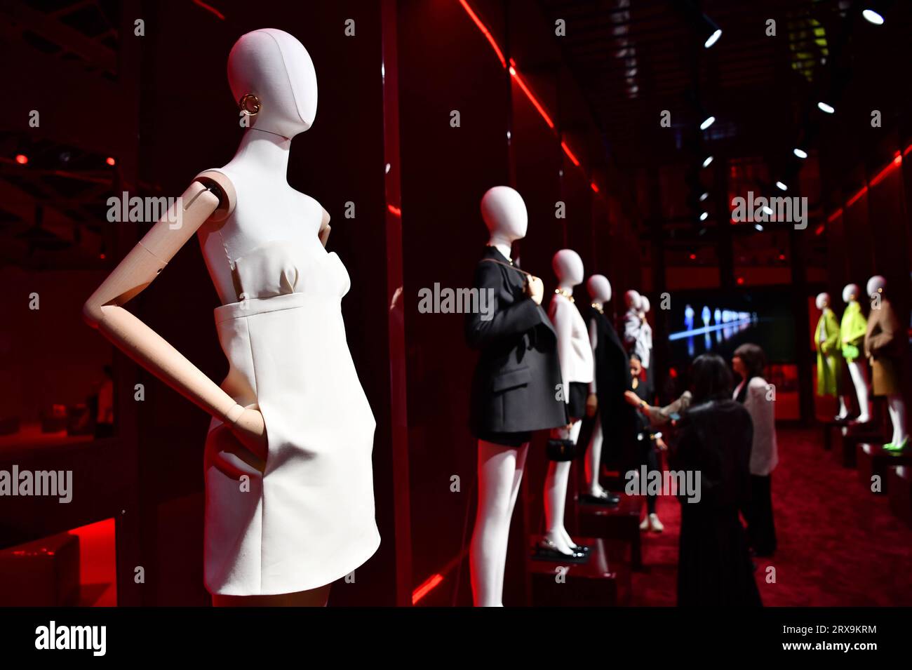 Milan, Italy. 23rd Sep, 2023. People watch creations from Gucci women's Spring/Summer 2024 collections at the resee-themed event during Milan Fashion Week in Milan, Italy, on Sept. 23, 2023. Credit: Jin Mamengni/Xinhua/Alamy Live News Stock Photo