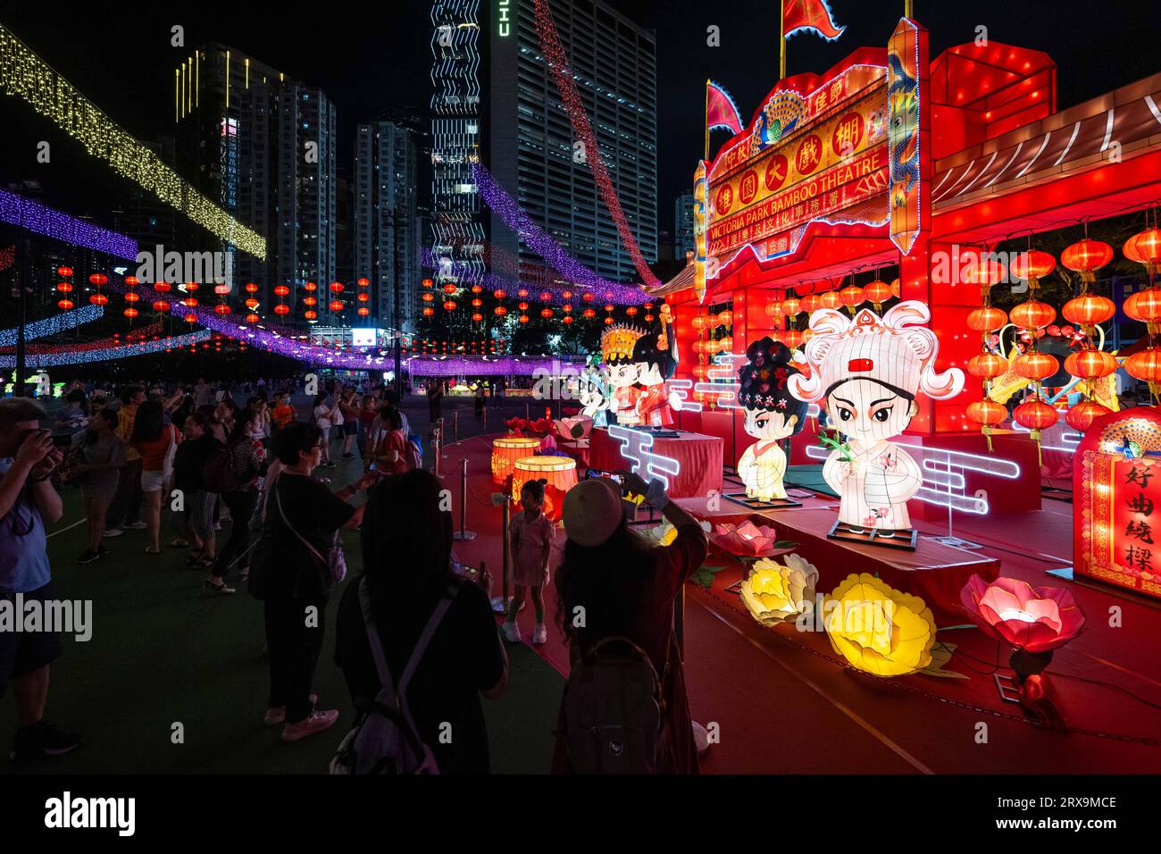 Hong Kong, China. 23rd Sep, 2023. People visit a Mid-Autumn lantern fair at Victoria Park in Hong Kong, south China, Sept. 23, 2023. Credit: Zhu Wei/Xinhua/Alamy Live News Stock Photo