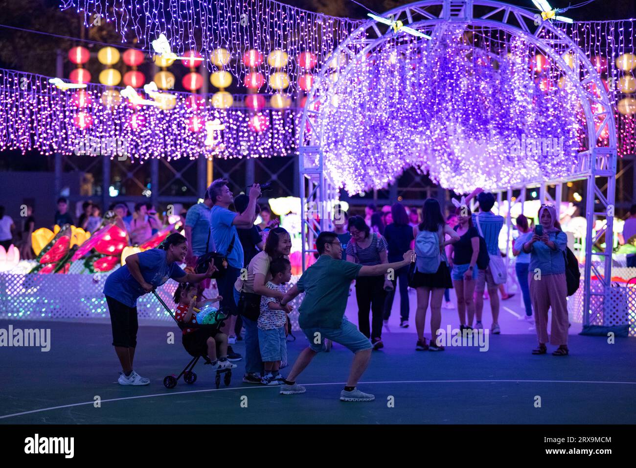 Hong Kong, China. 23rd Sep, 2023. People visit a Mid-Autumn lantern fair at Victoria Park in Hong Kong, south China, Sept. 23, 2023. Credit: Zhu Wei/Xinhua/Alamy Live News Stock Photo