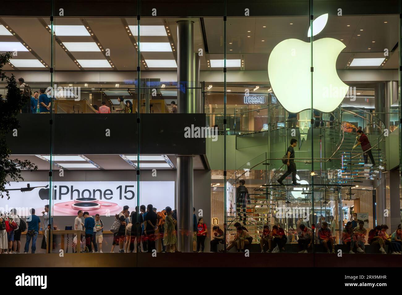 People buying the new Apple iphone 15 at the Hong Kong Apple store in central, Hong Kong, China. Stock Photo