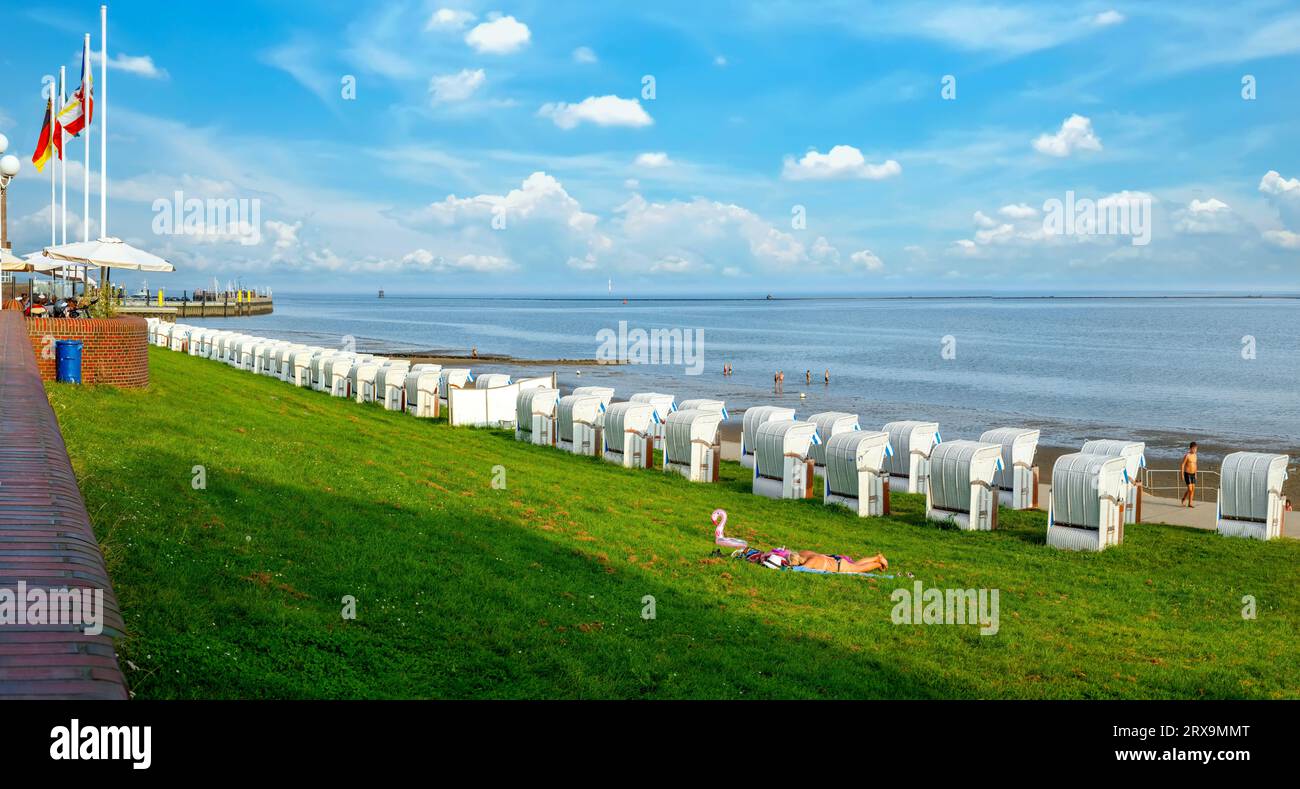 Beach with beach chairs and dike at the south beach in Wilhelmshaven