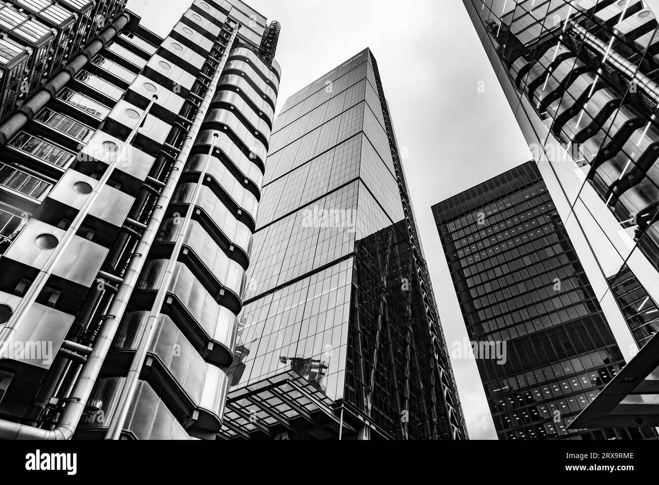 Modern black and white abstract reflections in glass fronted office ...