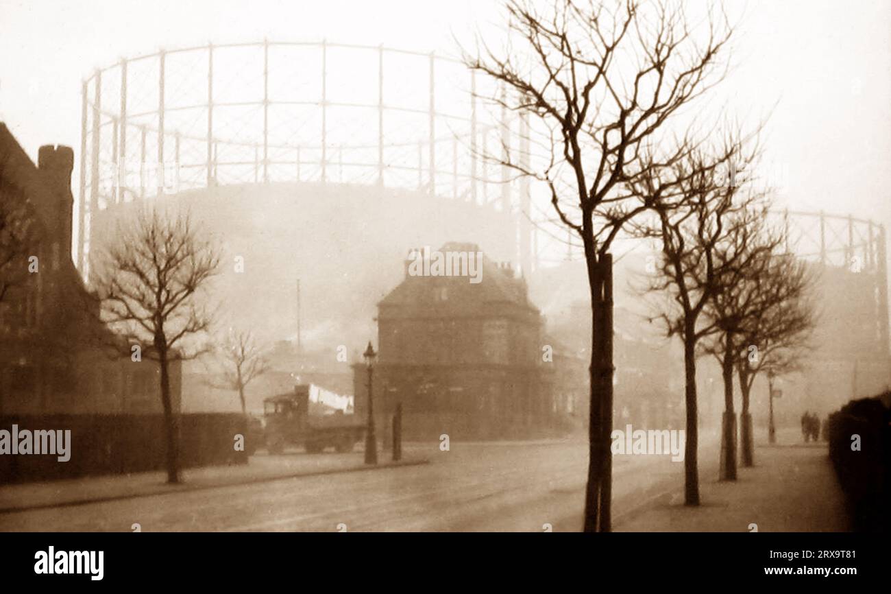 Gasometers in the early morning mist, probably 1920s Stock Photo