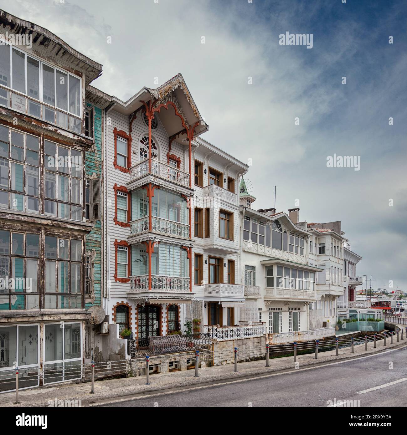 White wooden traditional residential buildings in Arnavutkoy neighborhood, Besiktas district, Istanbul, Turkiye, in a sunny spring day Stock Photo