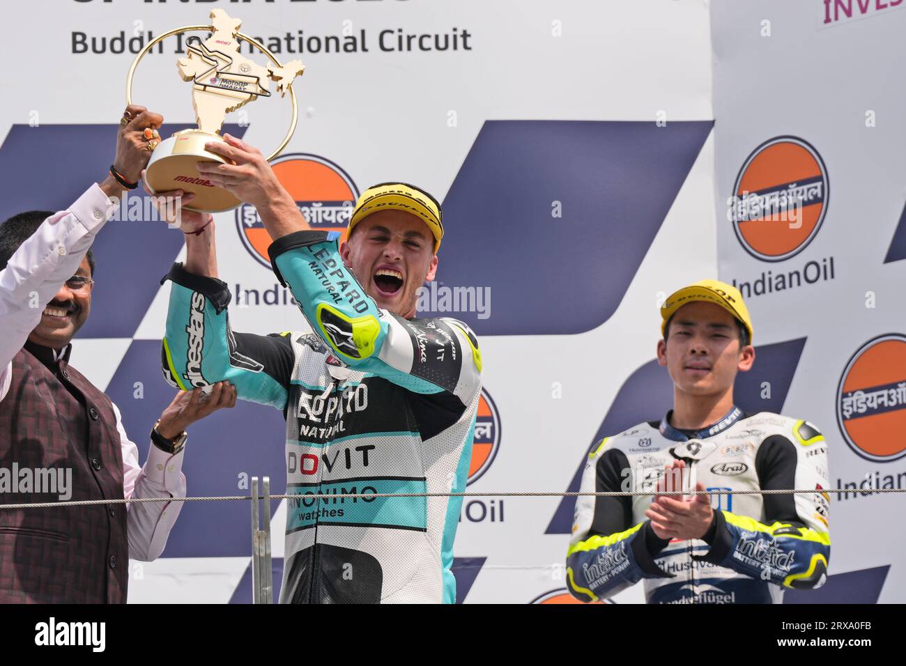 First place winner Leopard Racing team Spanish rider Jaume Masia, left ...
