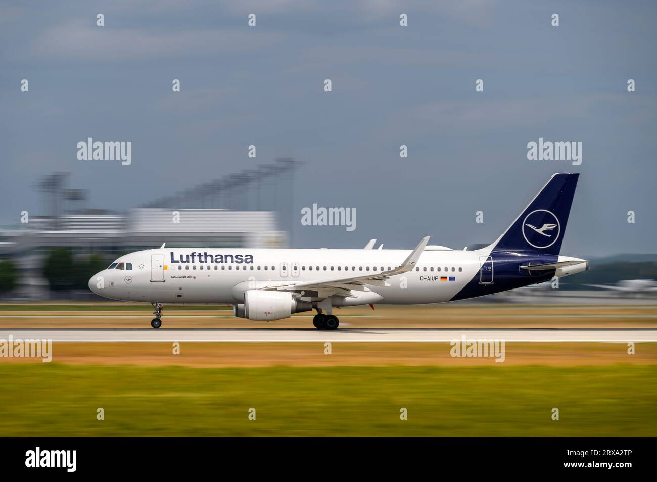 Munich, Germany - July 03. 2023 : Lufthansa Airbus A320-214 with the aircraft registration D-AIUF is starting on the southern runway 26L of the Munich Stock Photo