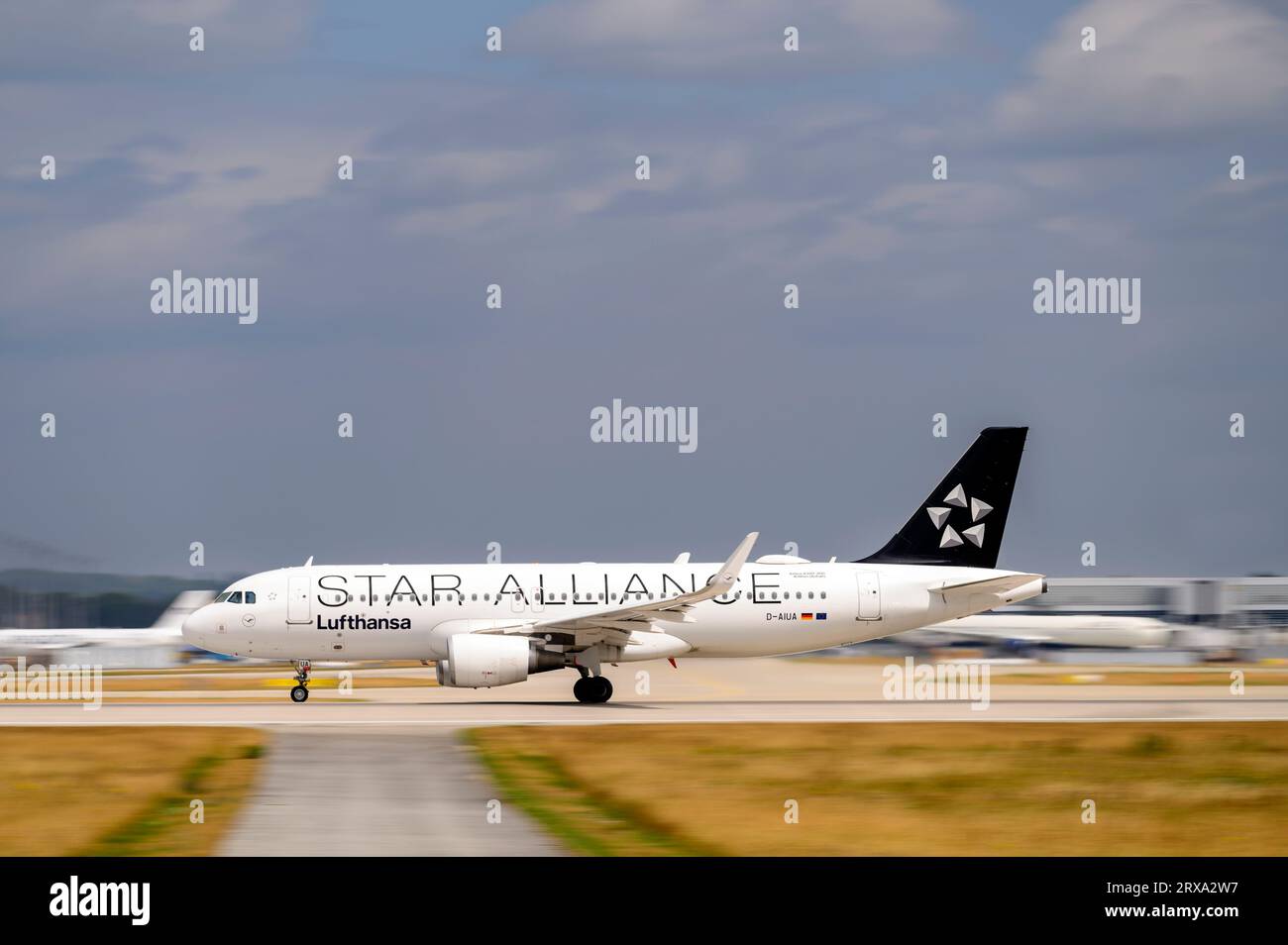 Munich, Germany - July 03. 2023 : Lufthansa Airbus A320-214 with the aircraft registration D-AIUA is starting on the southern runway 26L of the Munich Stock Photo