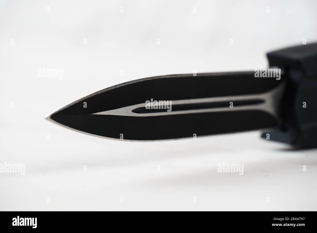 Switchblade (automatic) outthefront (OTF) knife with black handle and