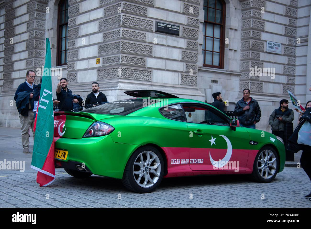 Imran Auto London, UK. 23rd Sep, 2023. A car painted with the PTI flag inscribed ...