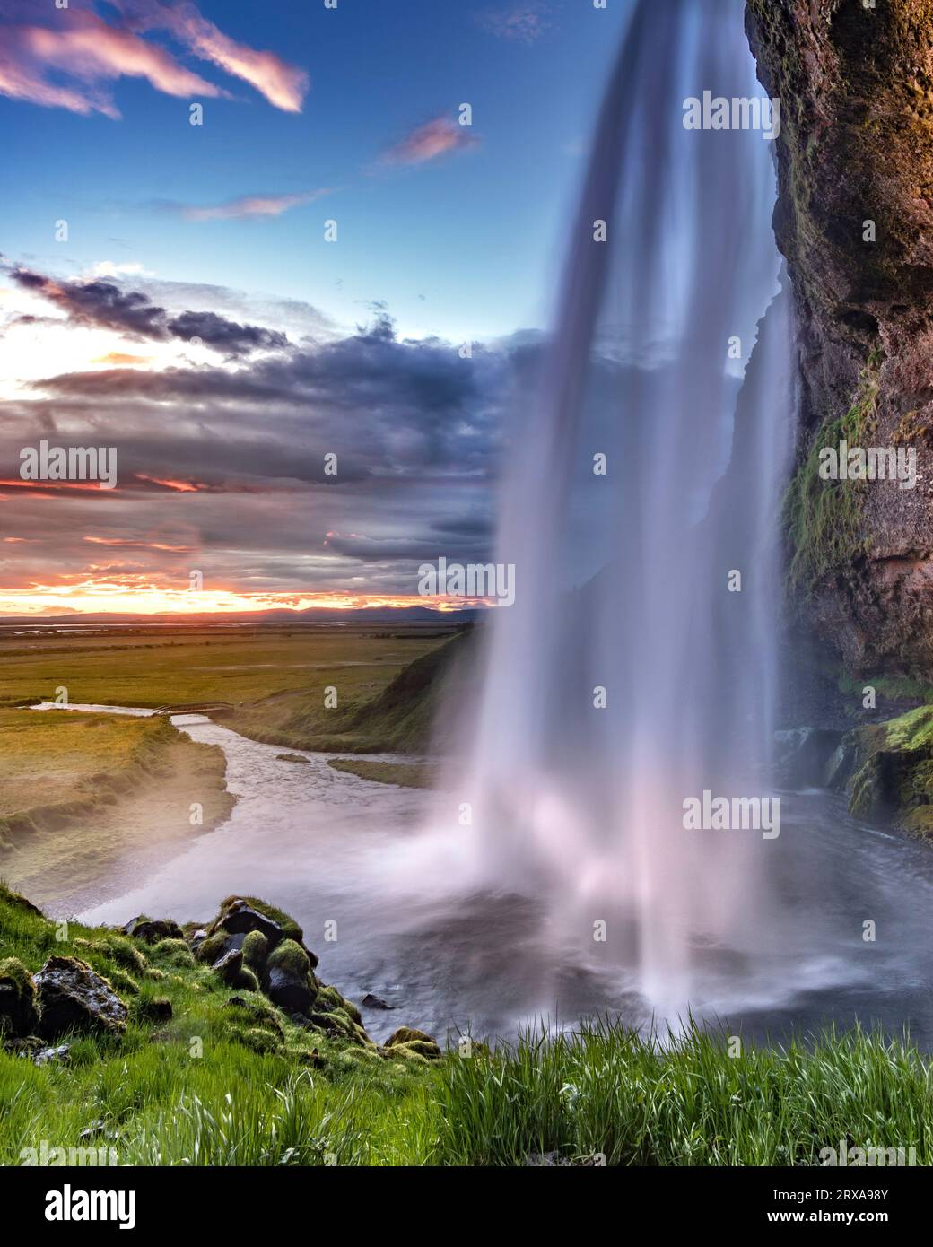 Sunset at Seljalandsfoss Waterfall in Iceland Stock Photo - Alamy