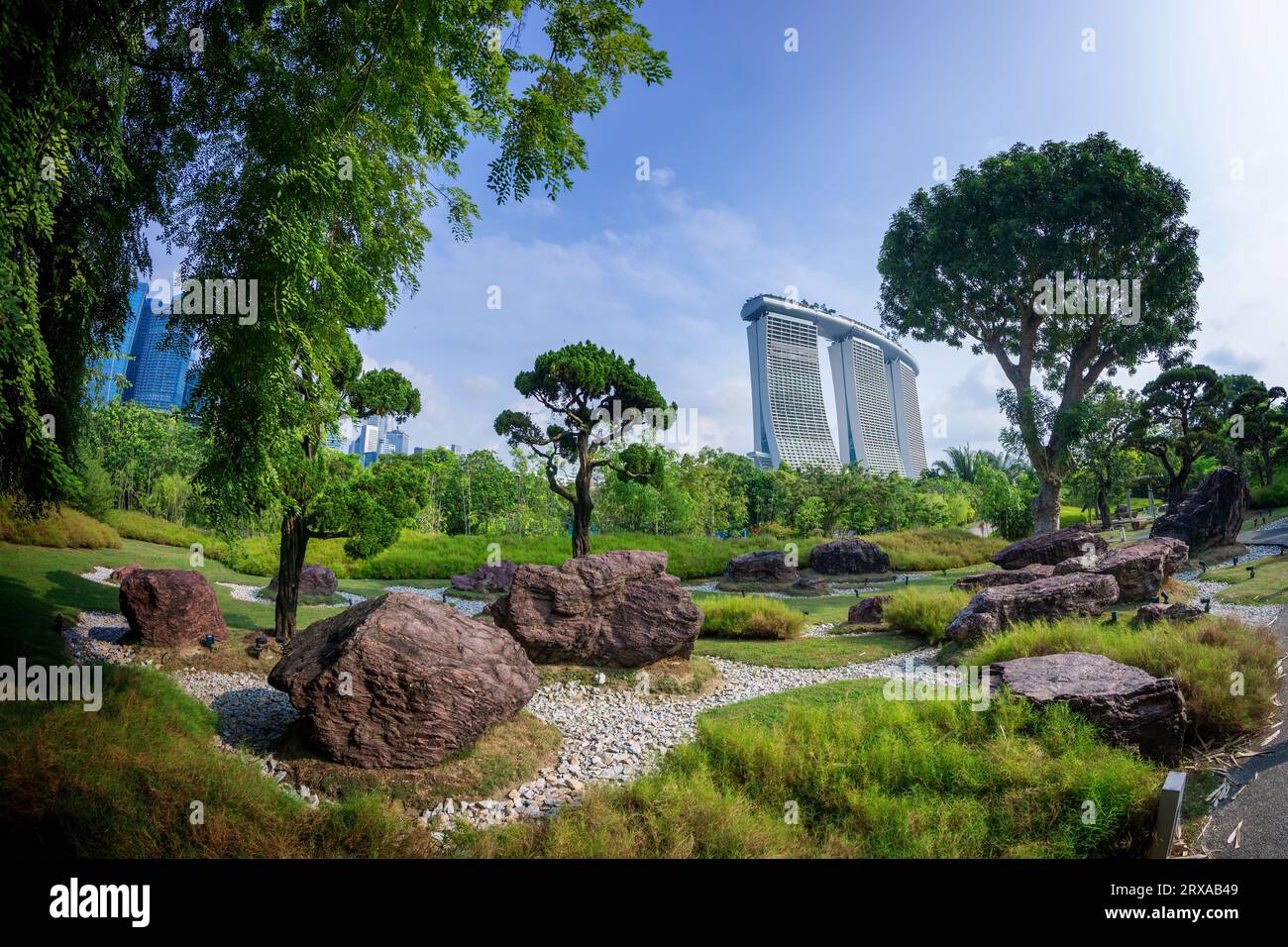 Serene Garden inspired by the concept of Japanese Zen gardens with iconic Marina Bay Sands building in background. Gardens by the Bay, Singapore Stock Photo