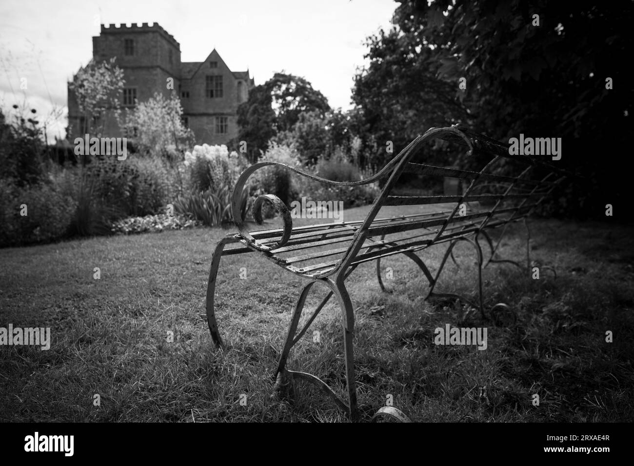 A bench in the gardens of Chastleton House, Oxfordshire Stock Photo